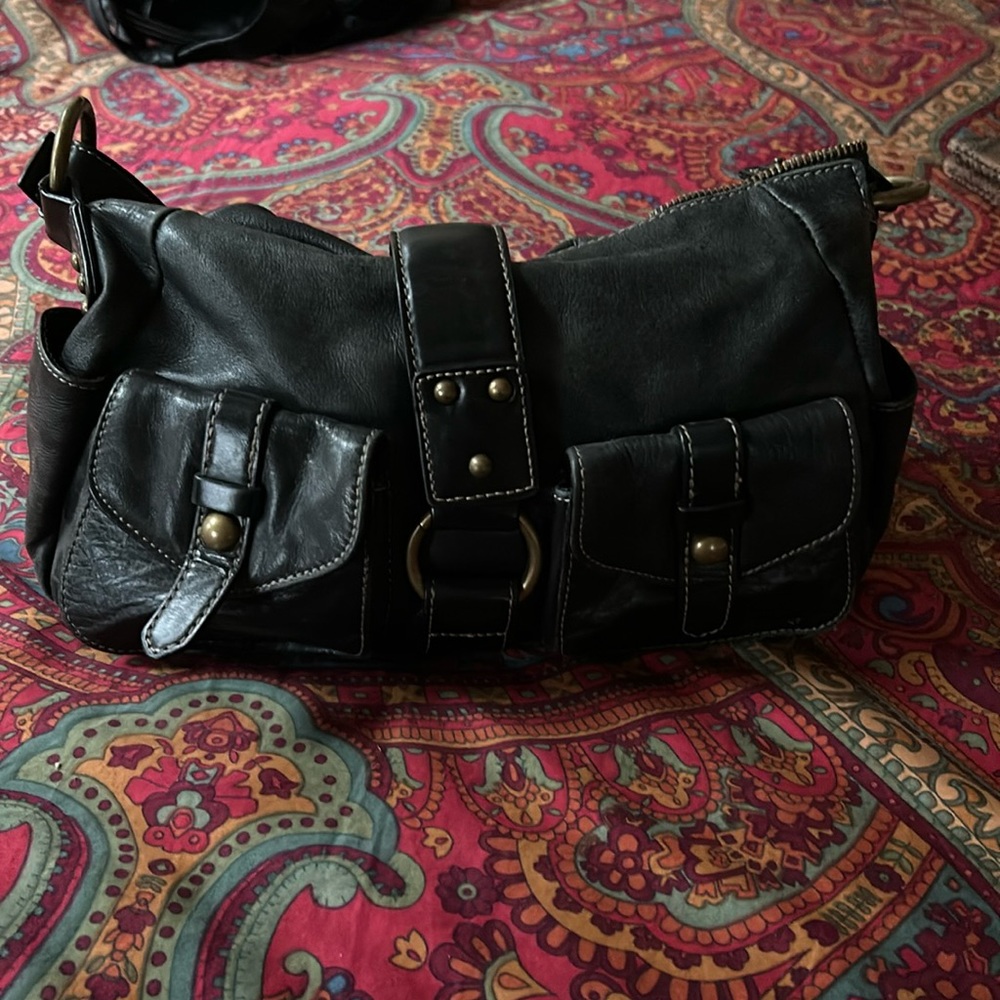 Luce’ black leather purse with lots of charm!